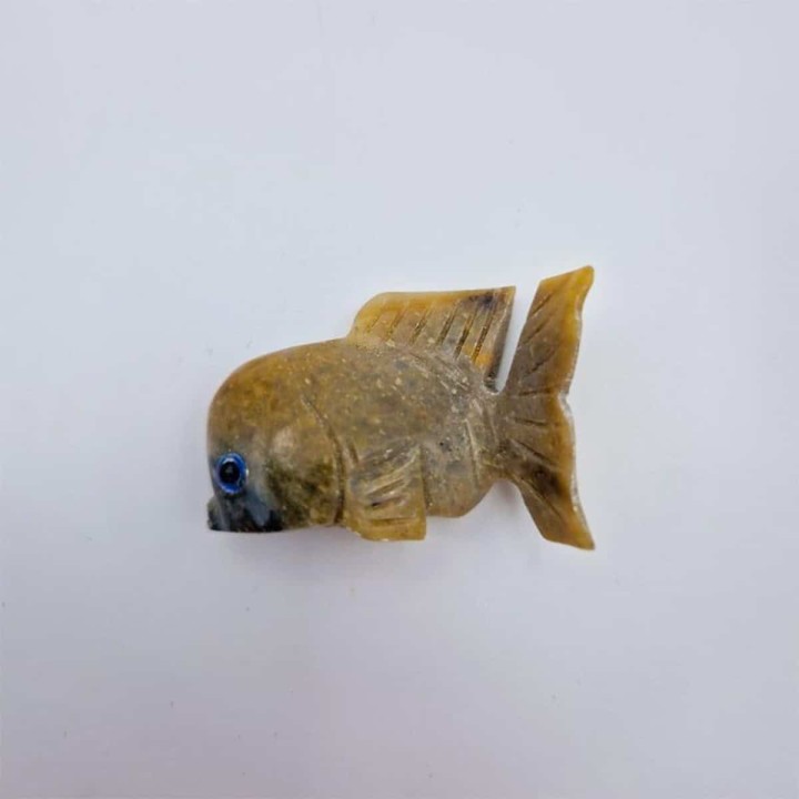 Poisson en pierre, sculpture animale