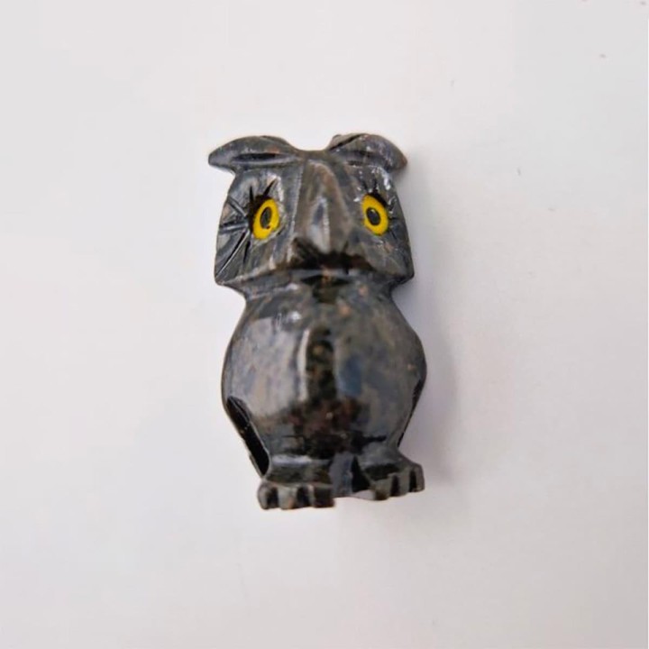 Chouette en pierre, sculpture animale